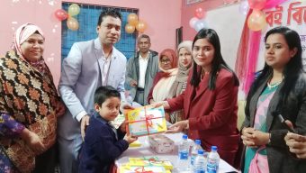 ঘিওরে শিক্ষার্থীদের মাঝে বিনামূল্যে বই বিতরণ